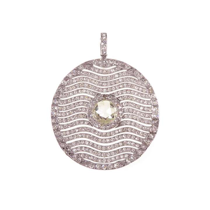 Articulated diamond circle pendant by Cartier